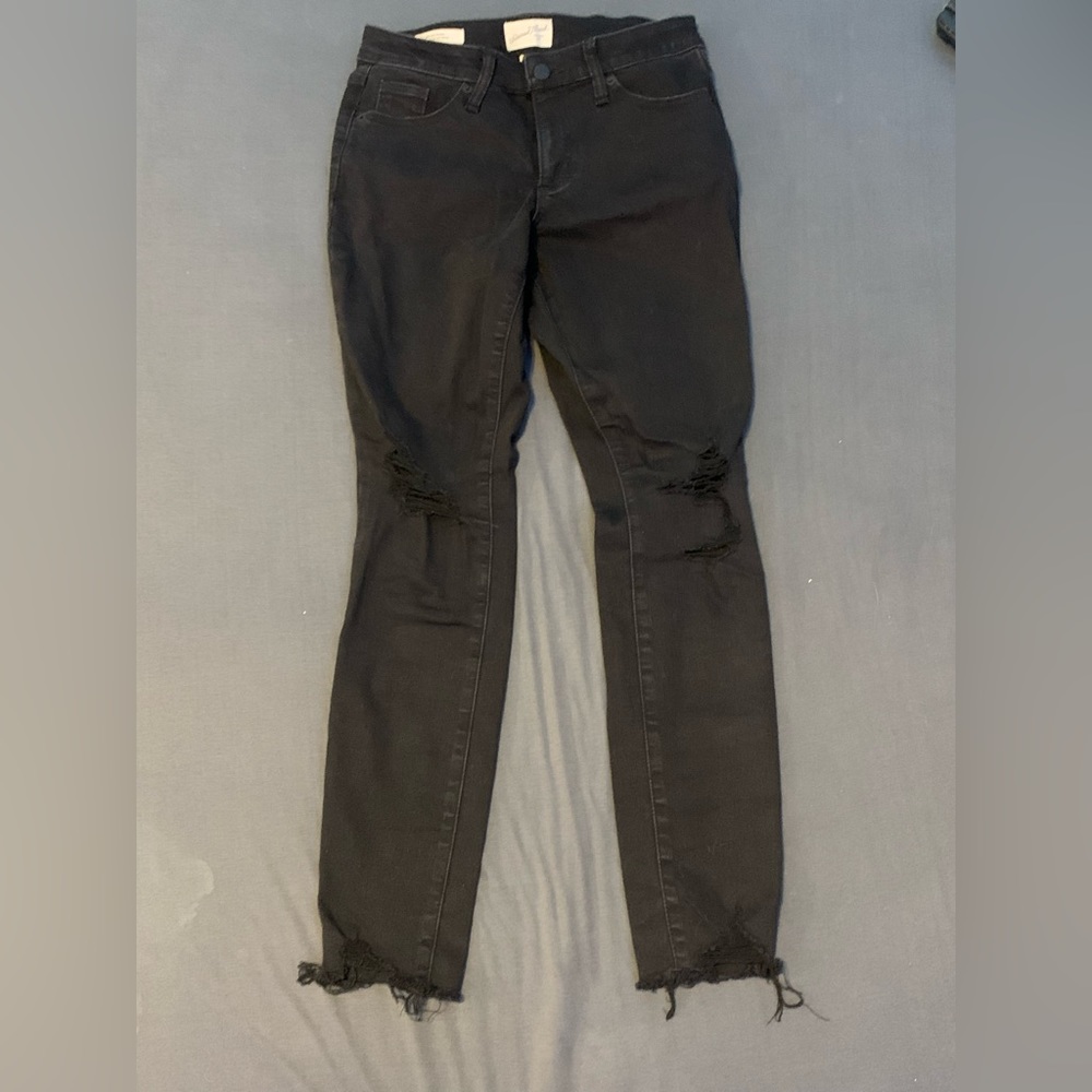 black mid rise skinny jeans